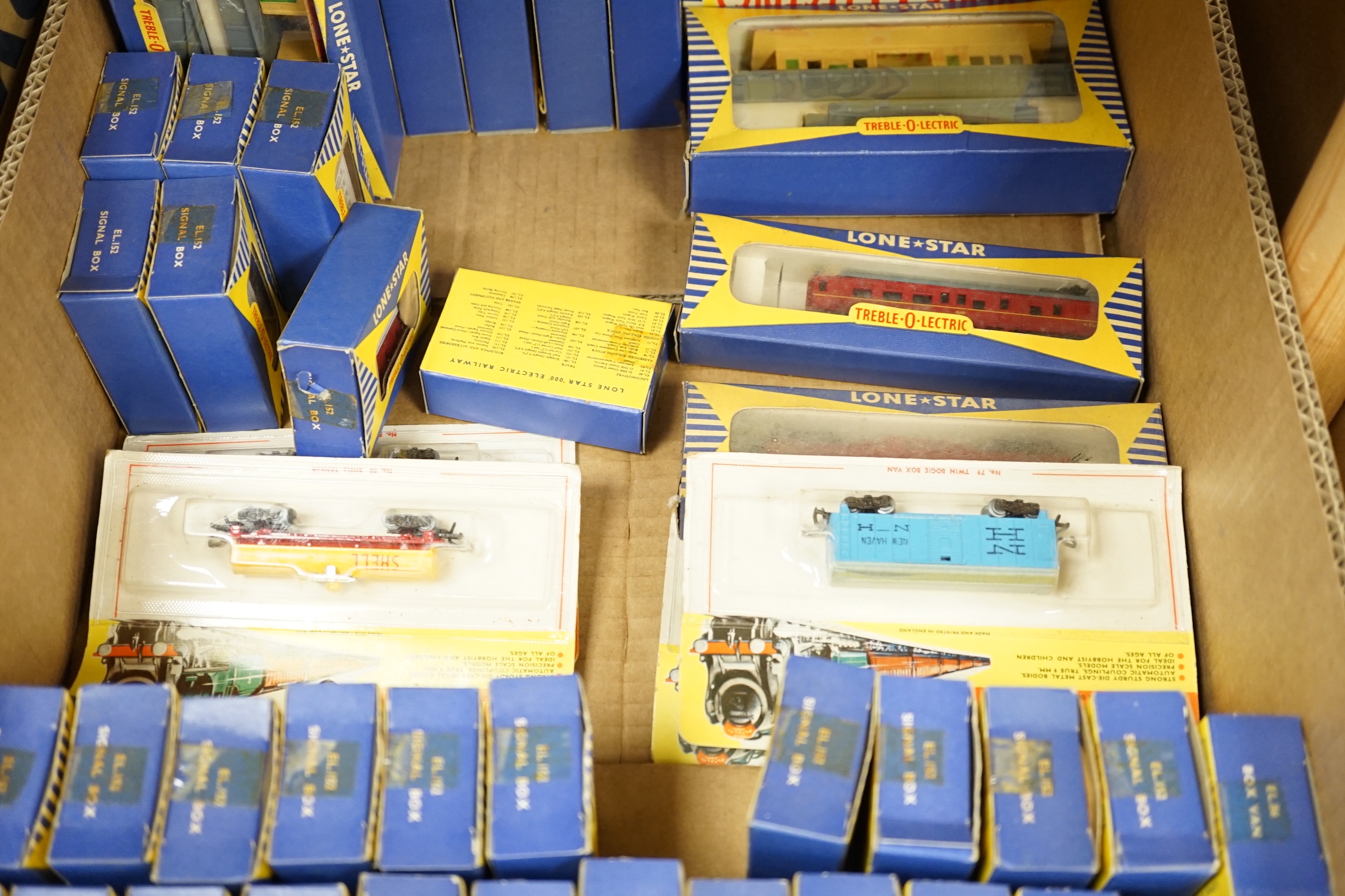 Seventy-two boxed items of Lone Star 000 gauge model railway including; a tunnel, Brake End Coaches, bogie wagons, station platforms, platform extensions, signal boxes, box vans, and telegraph poles